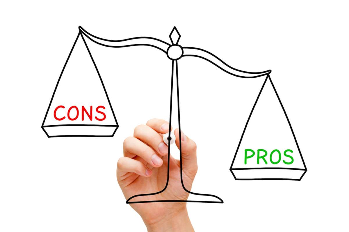 Hand drawing Pros and Cons scale concept