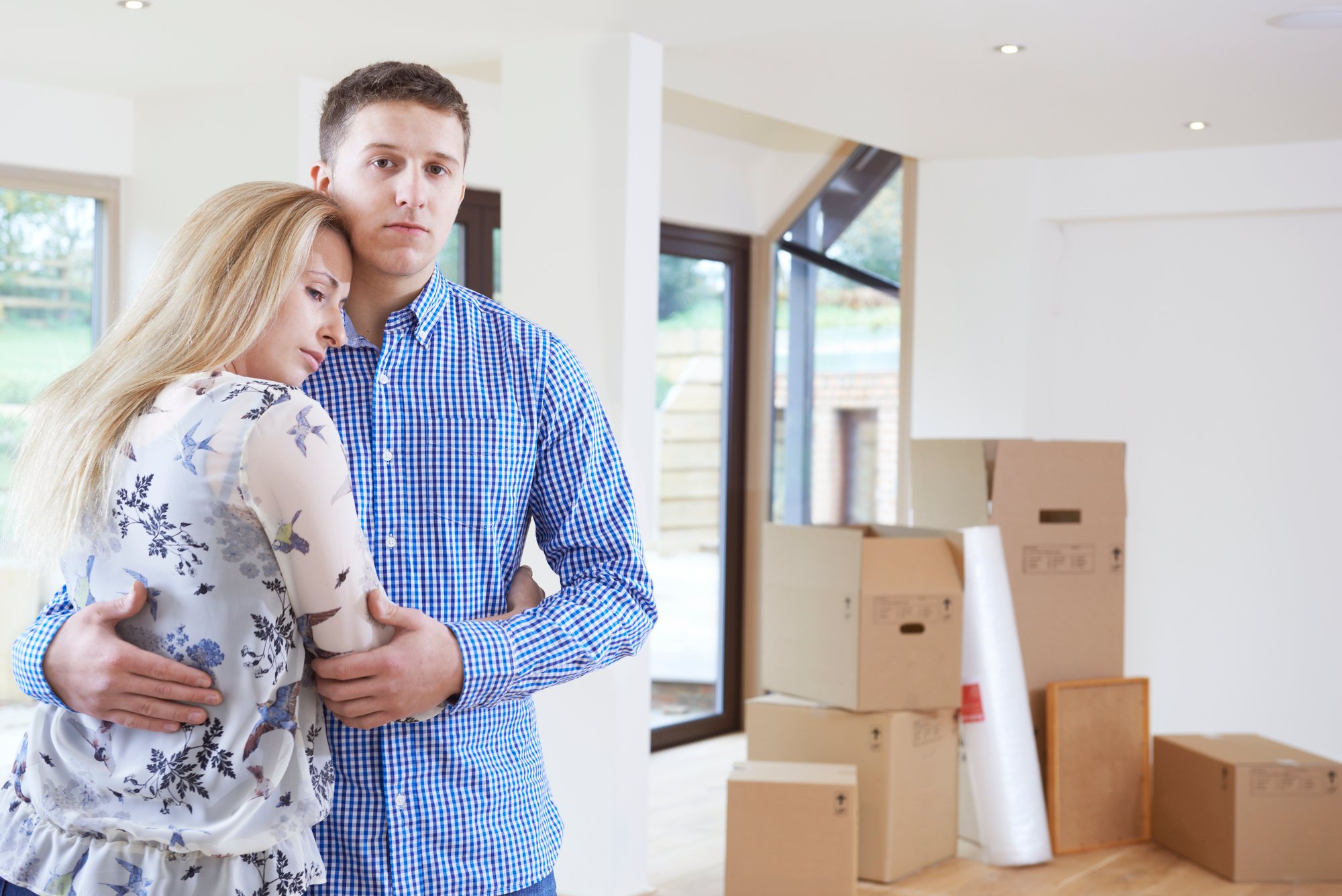 Young Couple Forced To Move Home Through Financial Problems