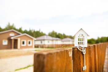 small figure of a white wooden house