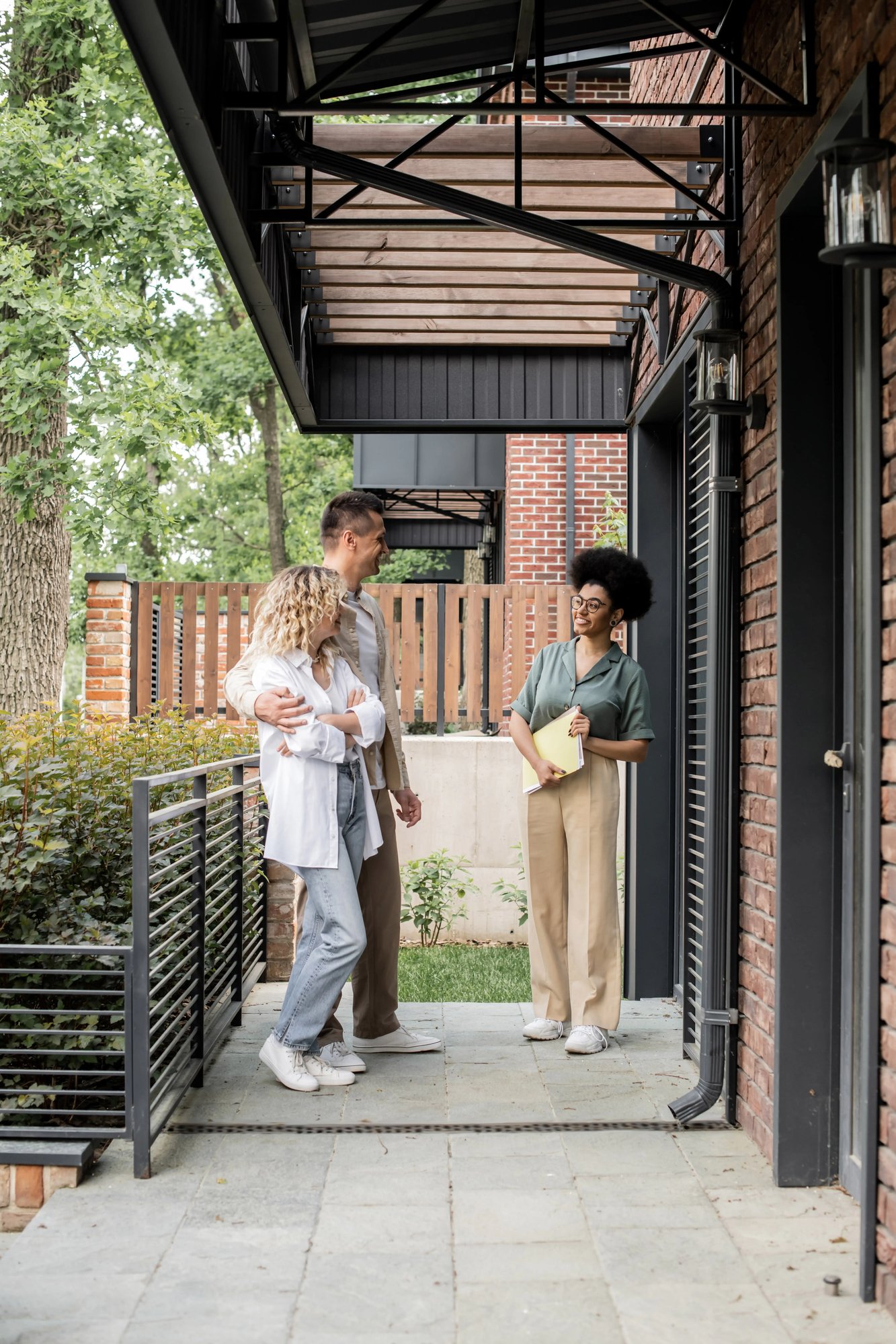 smiling-real-estate-agent-with-family