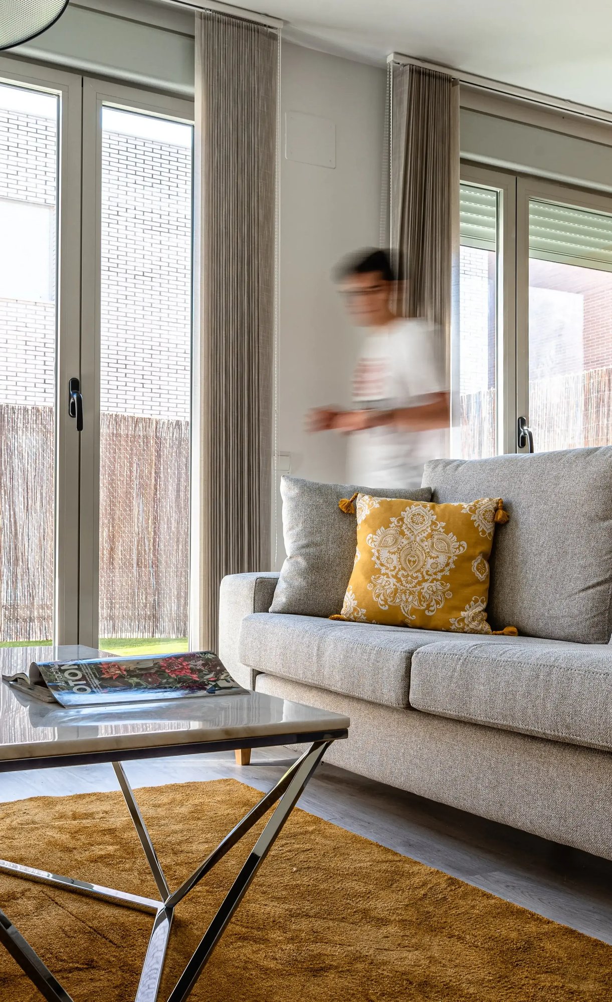 Stylish apartment with man walking through