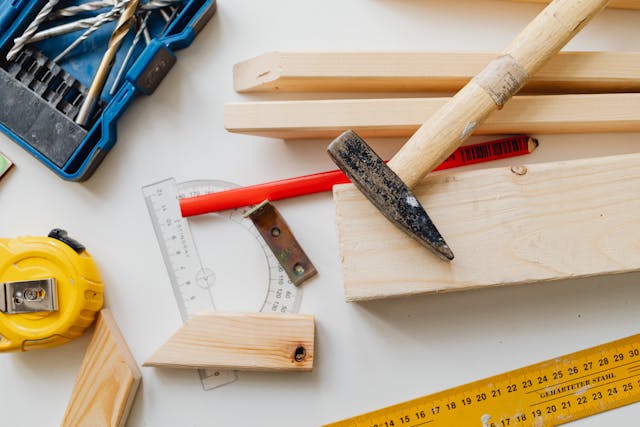 woodworking-tools-and-materials-on-white-surface woodworking-tools-and-materials-on-white-surface