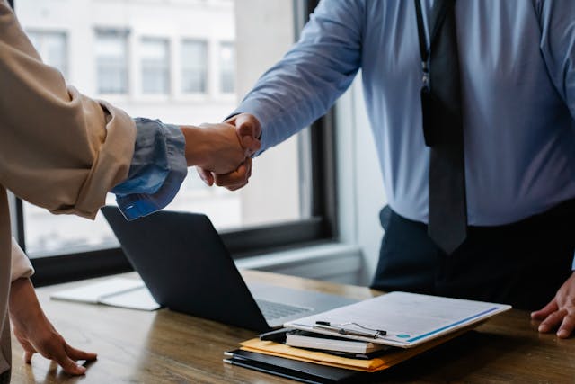 business-meeting-shaking-hands business-meeting-shaking-hands