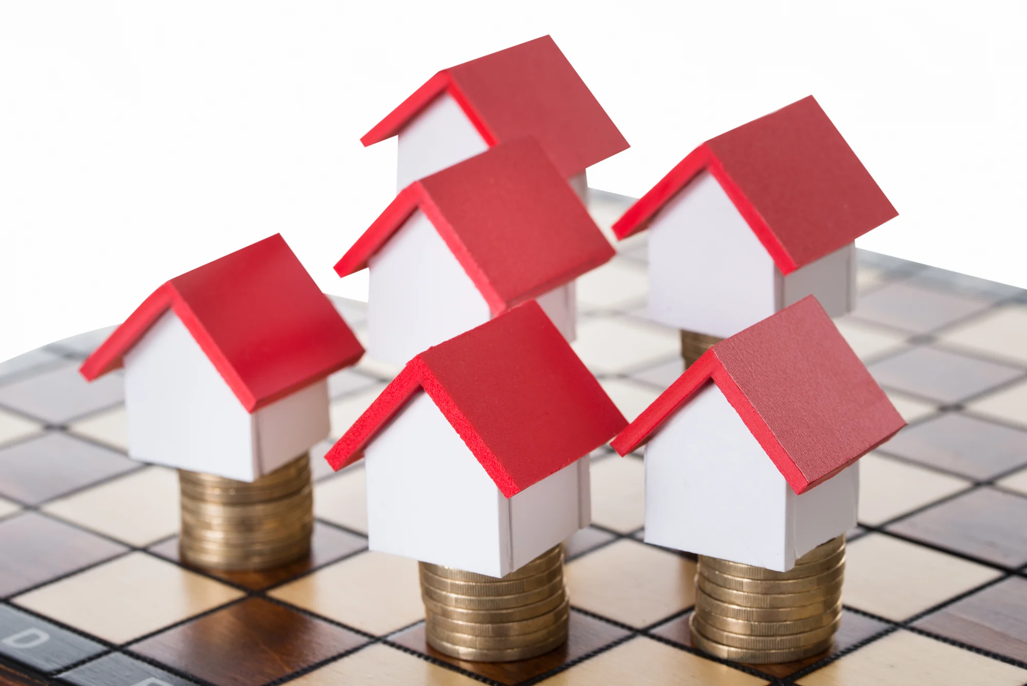 Houses_20Models_20And_20Stacked_20Coins Houses_20Models_20And_20Stacked_20Coins