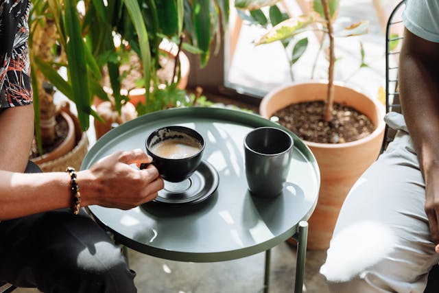 two-people-having-coffee-sunny two-people-having-coffee-sunny